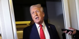Donald Trump speaking to reporters aboard Air Force One on Sunday